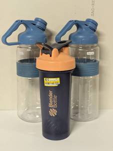 lot 239 image: 3 Piece Bottle Set - 1 Blender Bottle and 2 Large 1.5L Water Jugs