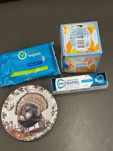 Assortment of Household Items Including Toothpaste and Care Products