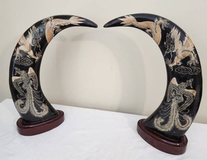 lot 27 image: Pair of Etched Dragon Phoenix Horns