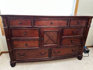 lot 37 image: Elegant Wooden Dresser with Drawers