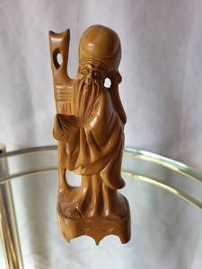lot 195 image: Intricate Wooden Carved Figurine