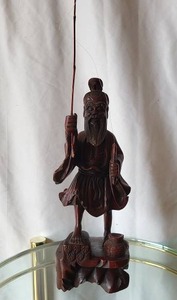 lot 113 image: Wooden Fisherman Sculpture
