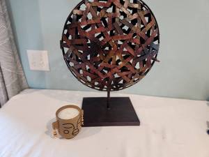 lot 66 image: Metal Sphere Tealight Sculpture & Face Candle