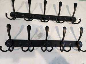 lot 102 image: Black Metal Wall Coat Racks Set