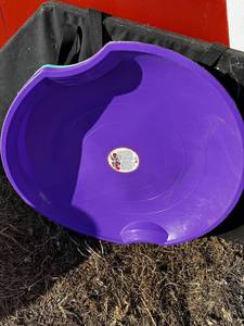 lot 19A image: Vibrant Plastic Sled for Winter Fun
