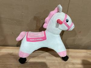 lot 427 image: Radio Flyer, Socks Rolling Pony, Plush Caster Ride-on Horse for Girls and Boys