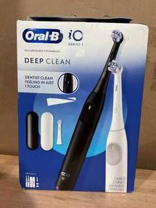 lot 465 image: Oral-B iO Series 2 Electric Toothbrush, Pure White & Night Black, 2pk