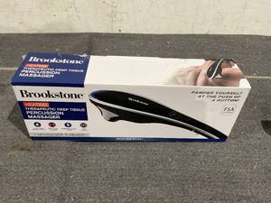 lot 212 image: Brookstone Handheld Percussion Body Massager, 4 Vibration Modes, 5 Interchangeable Heads