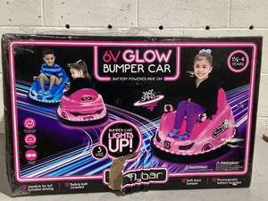 lot 544 image: 6V Pink Glow Bumper Car, Battery Powered Ride on for Children by Flybar, Ages 1.5, 66lbs, 1mph