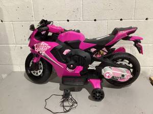 lot 560 image: 6V Barbie Motorcycle Ride on, Max 1 mph, for Kids Ages 3 Years, by Flybar