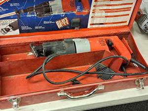 lot 11 image: Milwaukee Sawzall Heavy Duty Reciprocating Saw 6509 with Metal Case