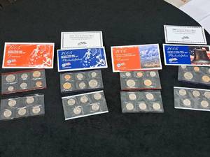 lot 213 image: U.S. Mint Uncirculated Coin Sets -  2005 Philadelphia Mint 11-pc, 2005 Denver Mint 11-pc, 2006 Philadelphia Mint 10-pc, 2006 Denver Mint 10-pc