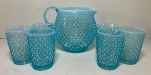 lot 63 image: Fenton Opalescent Hobnail Blue Glass Pitcher and Juice Glasses