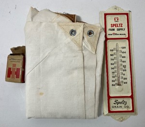 lot 65 image: International Harvester Valve, New Tractor Cover and Speltz Grain Thermometer
