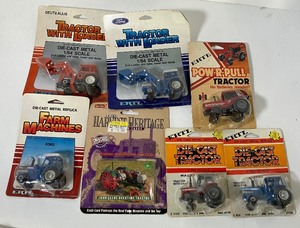 lot 76 image: Lot of 6 Ertl 164th Scale Tractors and Trading Cards