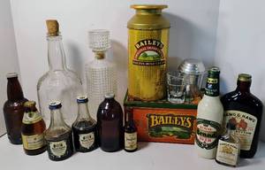 lot 106 image: Vintage Alcohol Decanter and Alcohol Tin Lot
