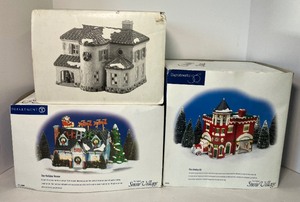 lot 129 image: Lot of 3 Dept. 56 Christmas Villages