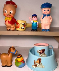 lot 190 image: Vintage Rubber Baby Toys and Tom Tipee Dishes 1930s Porky Pig and Sun Rubber Policeman Squeakers