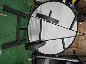 lot 9 image: Lot of a Pair of 25LB Two-Inch Metal Plates with a storage rack (Used, Like New)