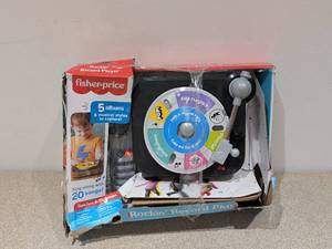 lot 39 image: NEW FISHER PRICE ROCKIN RECORDER PLAYER