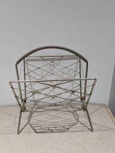 lot 106 image: VINTAGE NEWSPAPER & BOOK HOLDER