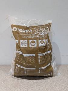 lot 120 image: BRAND NEW BAG OF PIEDRA PEBBLES