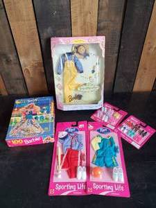 lot 19 image: Vintage Barbie and Ken Clothes and Accessories  Never Used and Puzzle