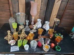 lot 21 image: Mid modern Lot of a Variety of Candle Holders and Accessories Pink Frosted Neon Amber and More