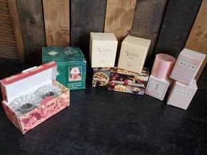 lot 23 image: Lot of Various Unused Candles with Candle Holders