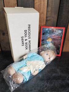 lot 33 image: Fantastic Precious Moments Doll and Book Never used