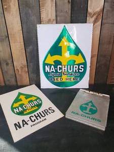 lot 109 image: Na Churs Liquid Fertilizer Signs and Metal Folder  Large Sign is Embossed and the Other is Cardboard