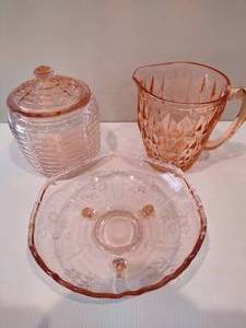 lot 70 image: Pink Depression Glass 3-Footed Bowl, Jar wLid & Pitcher
