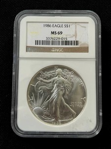 lot 9 image: 1986 Silver Eagle Dollar (NGC Graded MS-69) Mint State