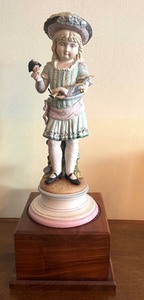 lot 79 image: Vintage 16.5 Bisque Girl Statue with Broken Doll Figurine