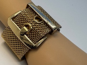 lot 213 image: Stylish Gold Tone Buckle Bracelet