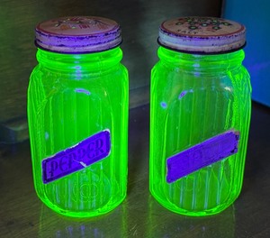 lot 36 image: Pair of Vintage Uranium Glass Salt and Pepper Shakers  Pair of Vaseline Glass Salt and Pepper Shakers