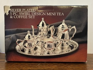 lot 340 image: New Silver Plated 5 Piece Swirl Design Mini Tea and Coffee Set  Paul Revere Silversmith