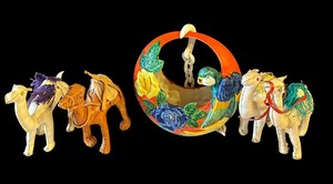 lot 395 image: Leather Camel Figurines and Vintage 1940s Parrot Majolica Ceramic Wall Pocket  Hanging
