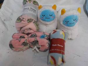 lot 21 image: Fleece Throws and Slippers...