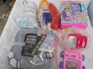 lot 23 image: 2 Throws and Dolls and Toys...