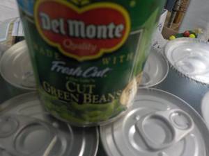lot 232 image: 12 ct 8 oz Del Monte Cut Green Bean...