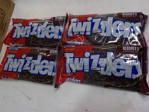 lot 301 image: 4 ct 12 oz bags Twizzlers Hersheys...