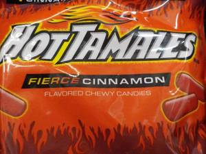 lot 335 image: 6 ct 10 oz Bags Hot Tamals...