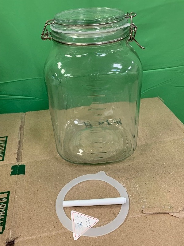 lot 9 image: 1.1 Gallon Glass Jar with Lid and 2 Glass Tumblers
