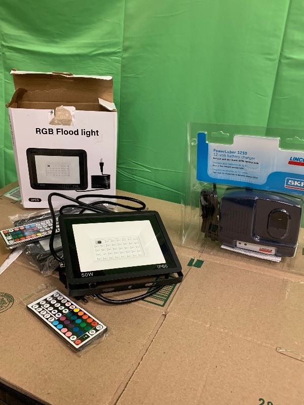 lot 20 image: FTL 50W LED Flood Light RGB & Lincoln 12 Volt Battery Charger