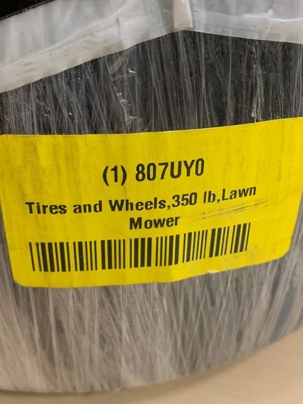 lot 181 image: Tire and Wheel for 350lb Lawn Mower
