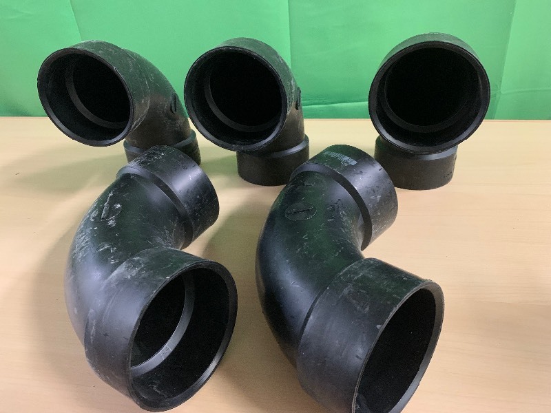 lot 192 image: Charlotte 3 BLACK PVC ELBOWS ABS 31-8330