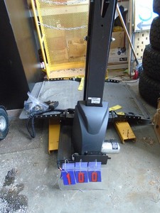 WheelchairScooter lift by Bruno Joey Model VSL 4000. 12 volt 500 lb. Lift clamps in existing seat track on vans. Tested & works. Hand control. As shown. THIS ITEM HAS A RESERVE.