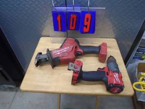 Milwaukee 18 volt cordless hacksaw & drill. No battery. Unable to fully test. As shown.
