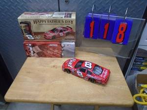 Dale Jr 124 car. New in box. As shown.